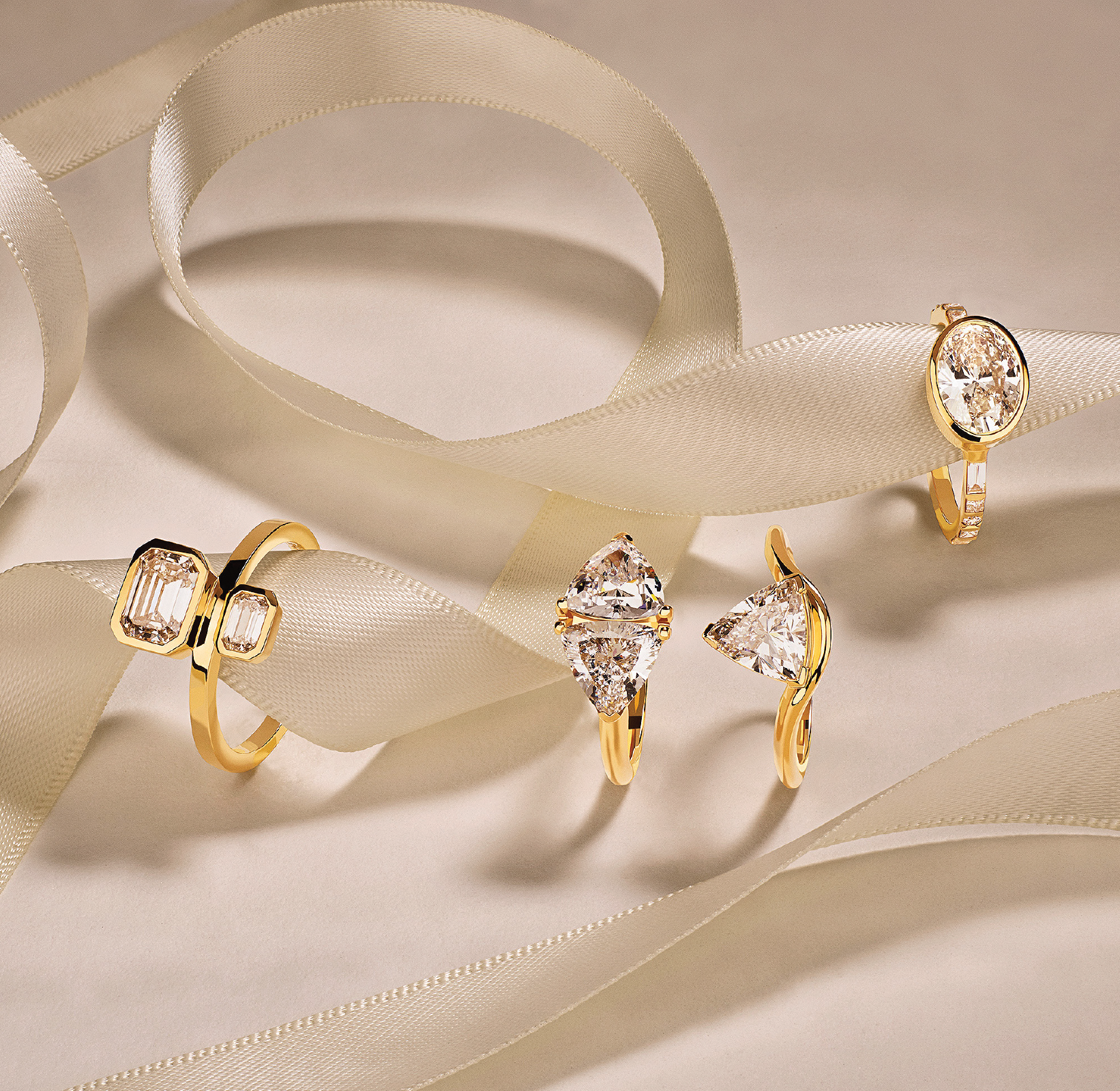 engagement rings on beige background