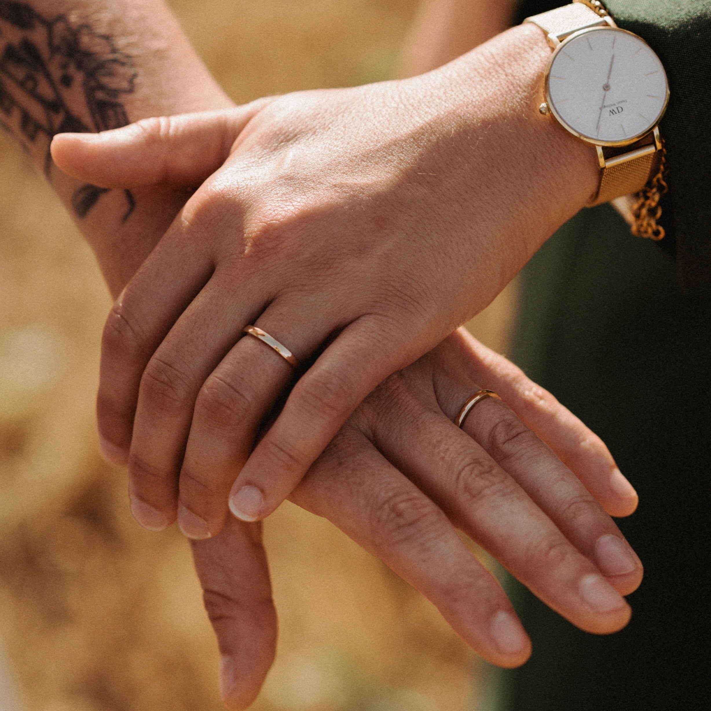 hands with wedding bands