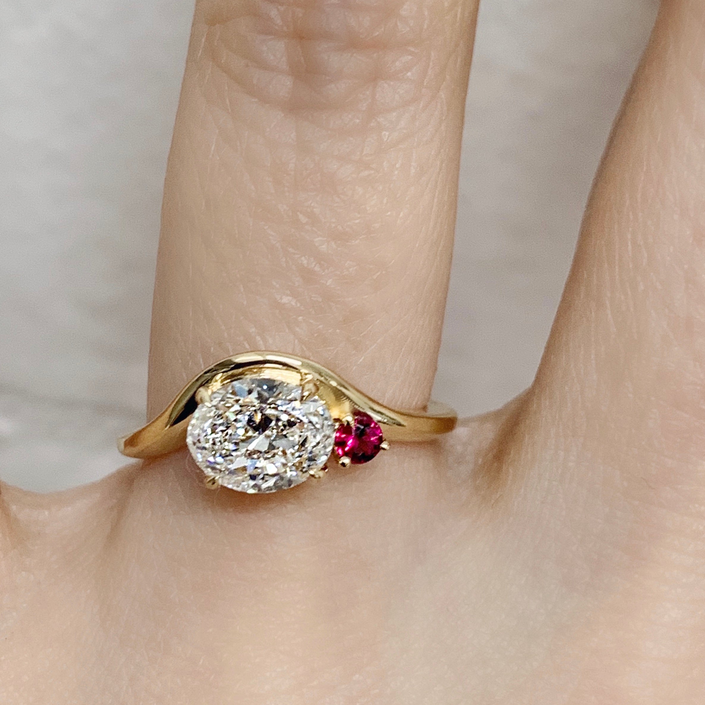 custom diamond ring on hand