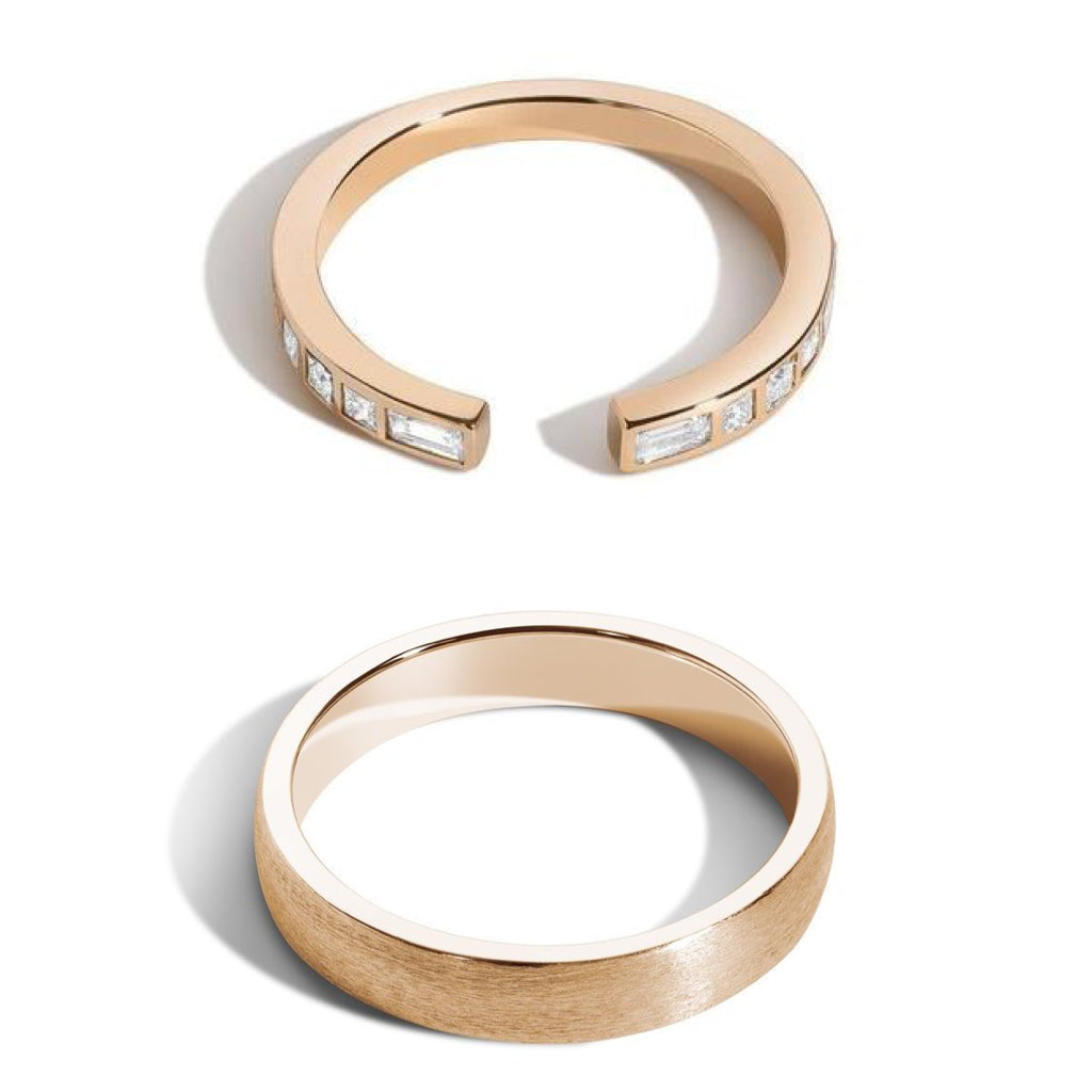 gold wedding bands on white background
