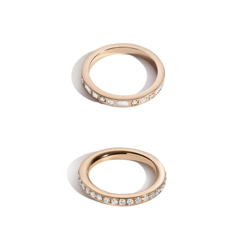 gold diamond ring on white background