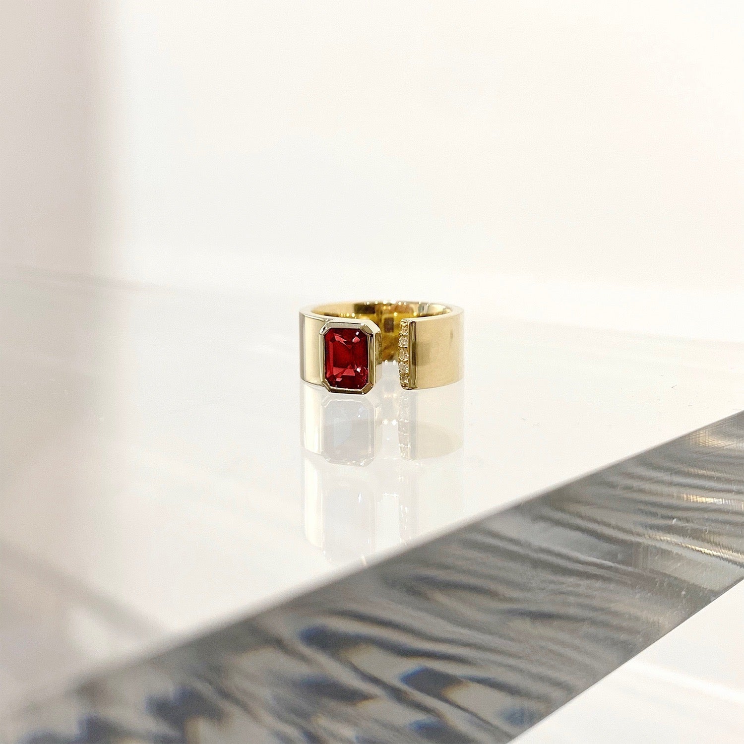 gold gap band with ruby stone