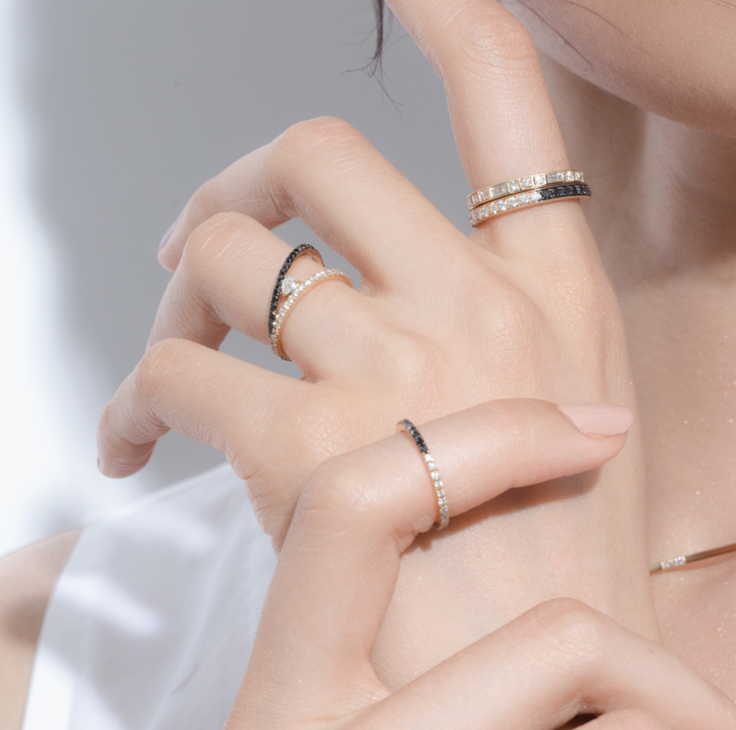 closeup diamond rings on hand