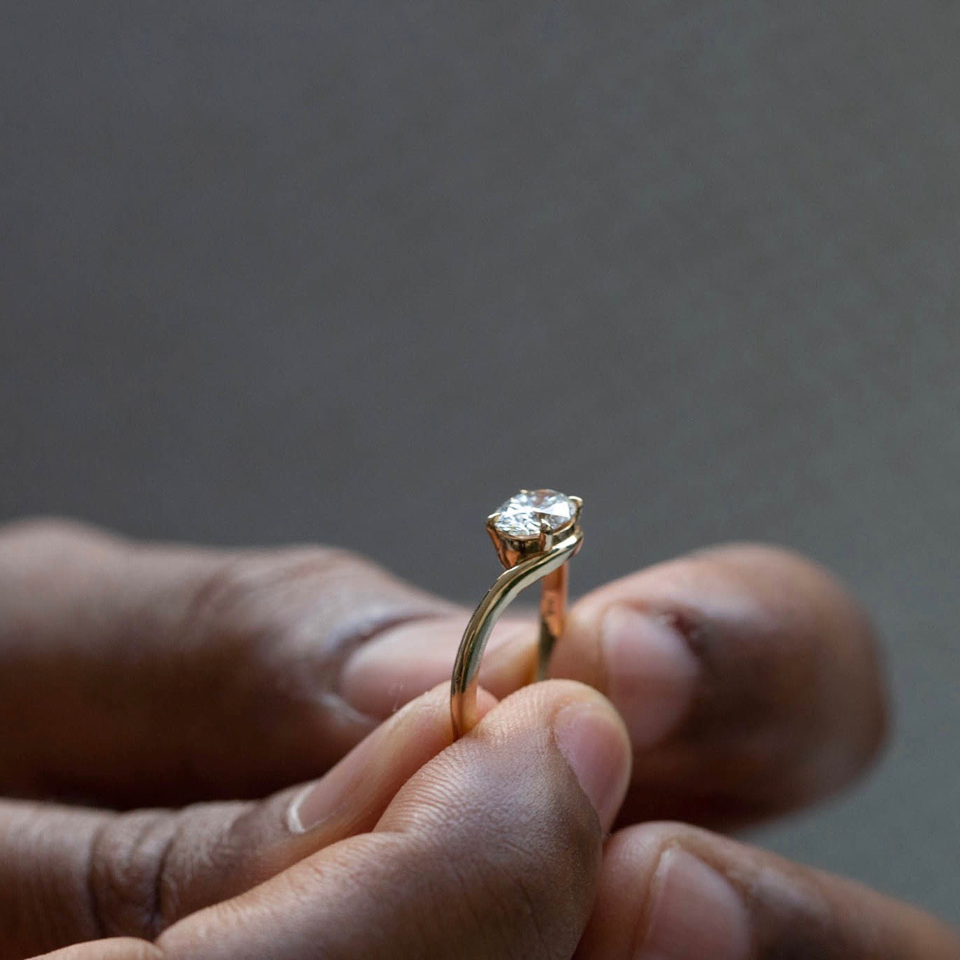 hand holding diamond ring