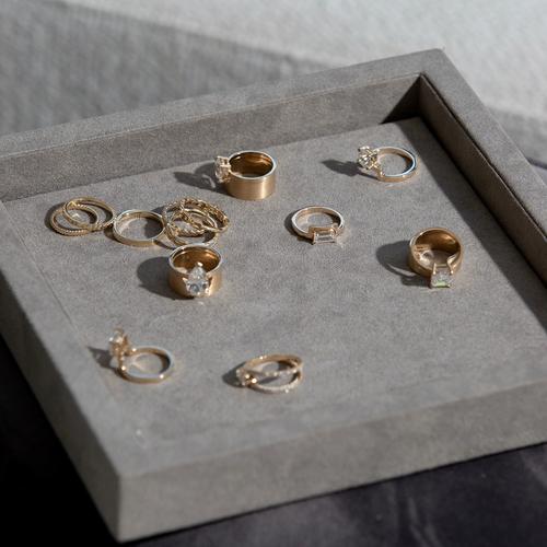 diamond rings on gray tray