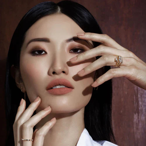 model with rings on hand