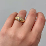 Bombe Heart Ring  by Shahla Karimi on hand on white background