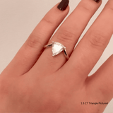 Triangle Eye Ring by Shahla Karimi on hand on white background