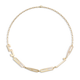 Gold necklace with letter links on a white background