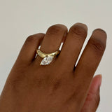 Cloud Offset Marquise Ring by Shahla Karimi on hand on white background