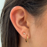 15mm Charming Huggies by Shahla Karimi on ear on light background