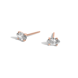 Marquise diamond studs in rose gold on white background