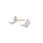 Shahla Karimi pair of emerald-cut diamond stud earrings with a yellow gold modern claw setting