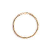 Yellow gold chain bracelet on white background