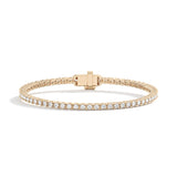 Shahla Karimi 3ct tennis bracelet in 14K yellow gold with round-cut diamonds on white background