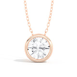 Shahla Karimi pendant in 14K rose gold with round-cut diamond on white background