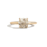 Gold ring with a diamond on a white background
