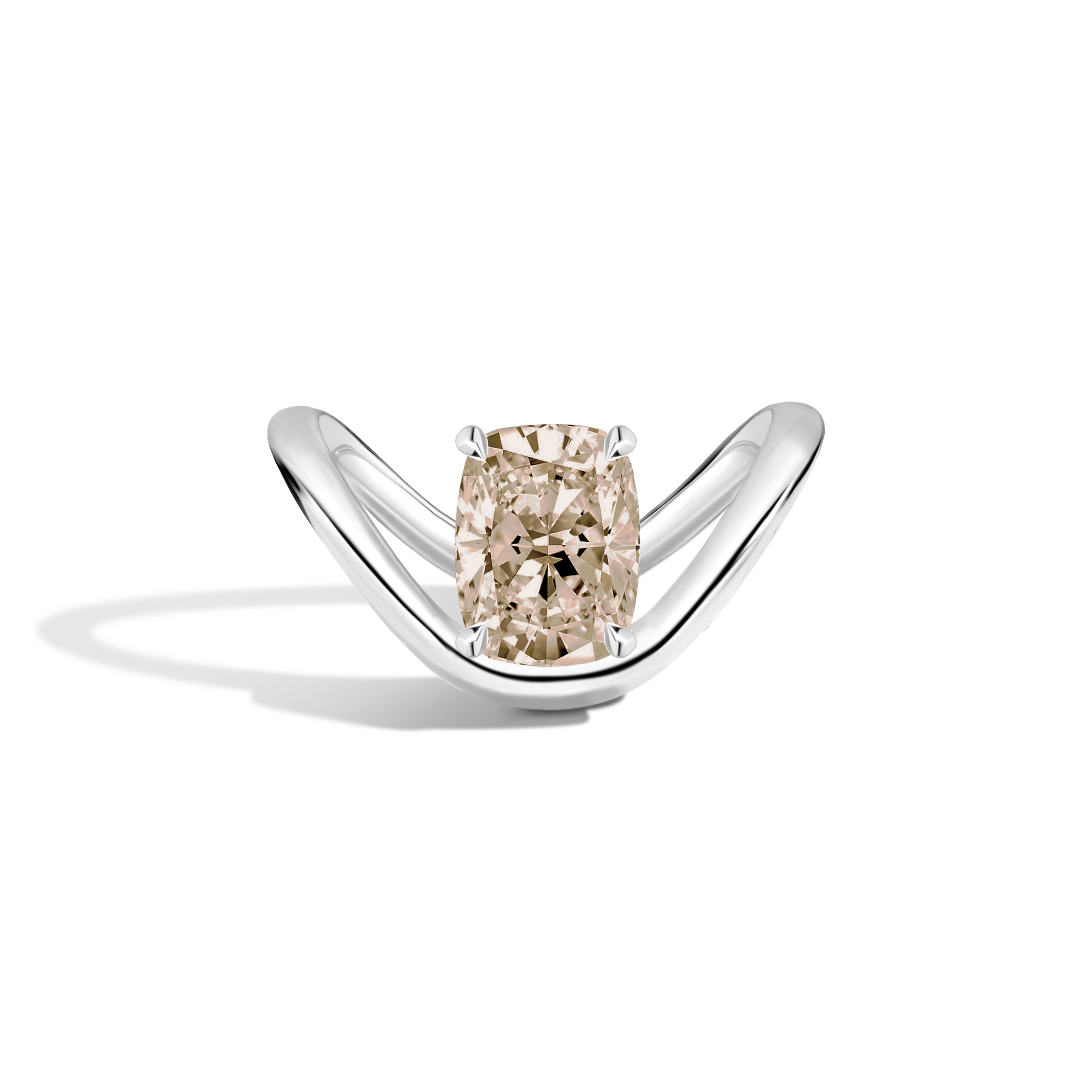 A silver ring featuring a large cushion-cut diamond with a champagne beige center, set on a sleek curved silver band against a white background.