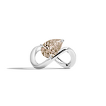 A white gold infinity-shaped ring featuring a tilted pear champagne diamond center stone, set against a clean white background with a soft shadow.