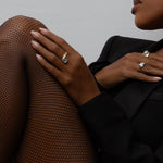 Shahla Karimi diamond jewelry on person in 14K White and Yellow Gold on light background