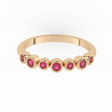 Bezel-Set Demi Ring with rubies by Shahla Karimi on white background