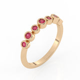 Bezel-Set Demi Ring with rubies by Shahla Karimi on white background