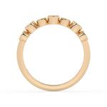 Bezel-Set Demi Ring with rubies by Shahla Karimi on white background