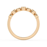 Bezel-Set Demi Ring with rubies by Shahla Karimi on white background