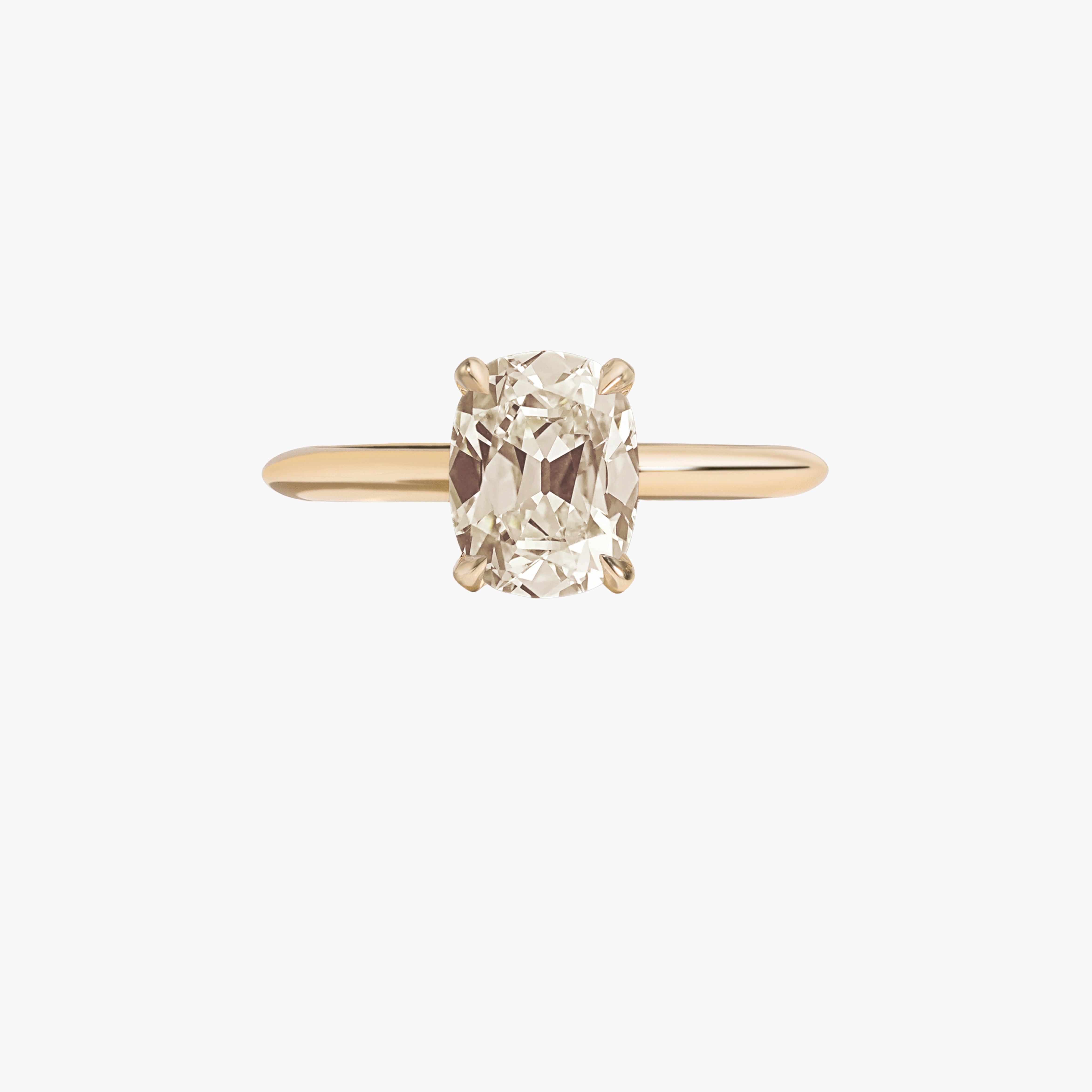 Gold ring with a diamond on a white background