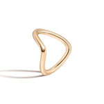 Gold infinity ring on a white background