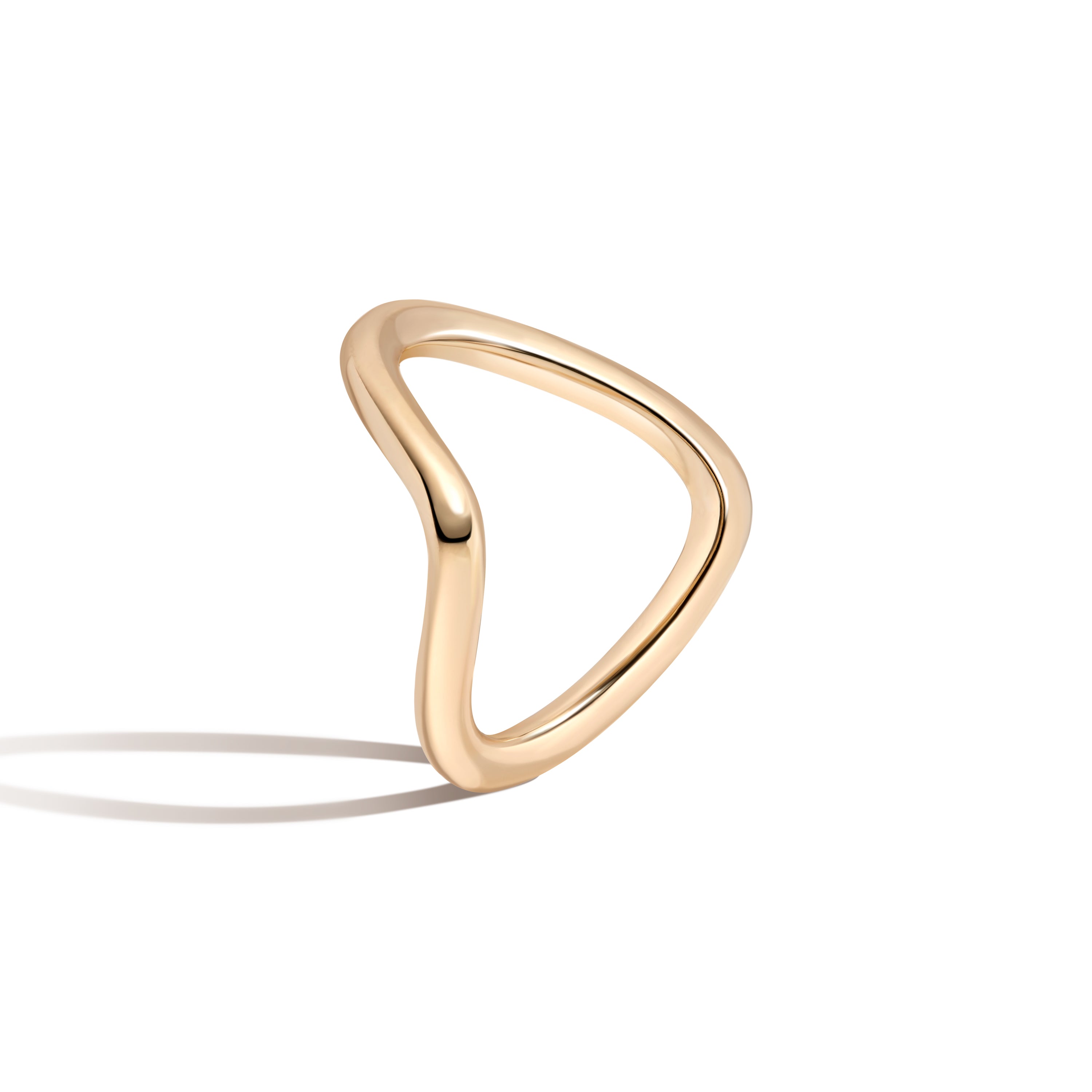 Gold infinity ring on a white background