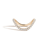 Yellow gold ring with pave diamonds on a white background