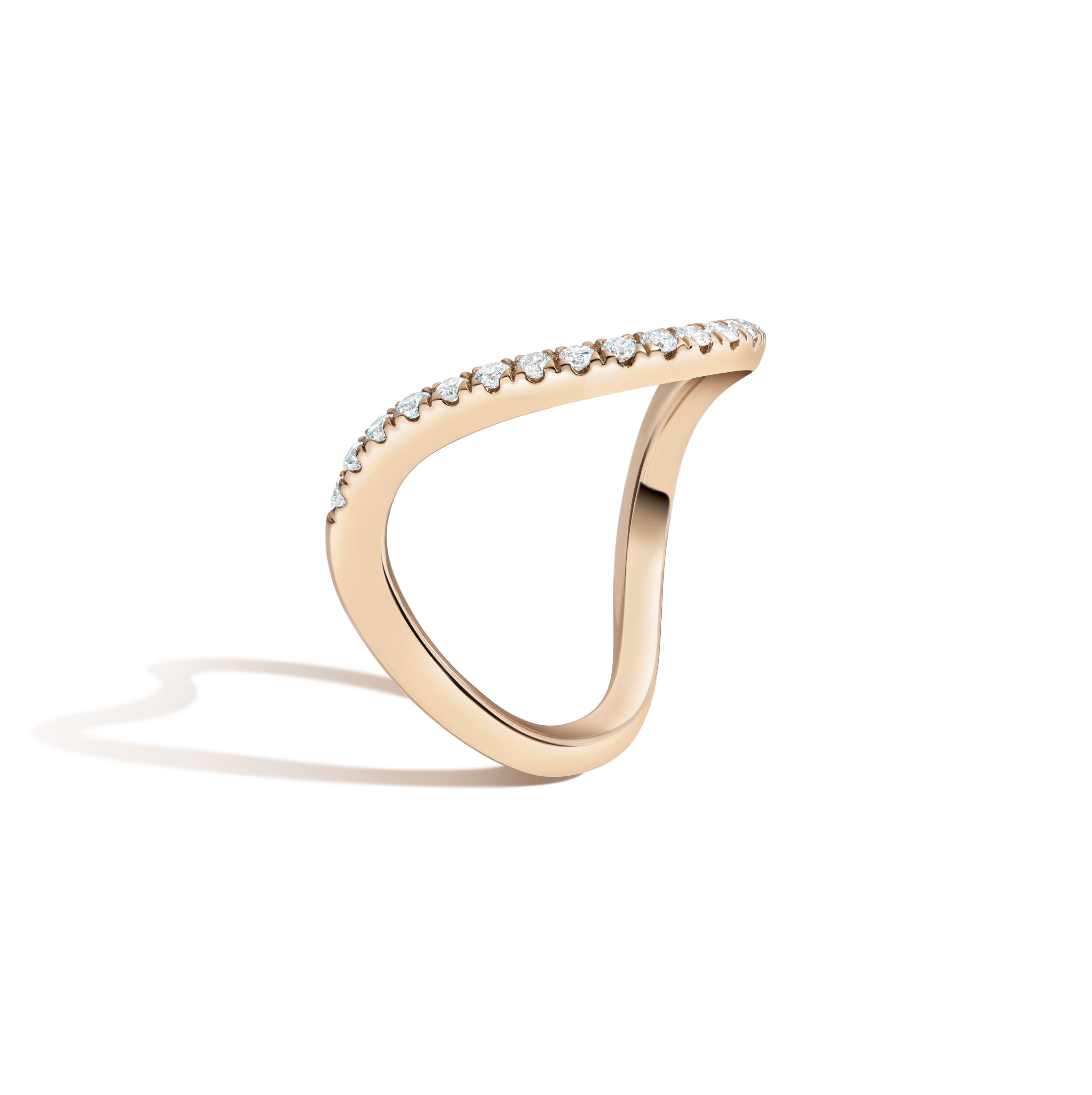 Gold ring with small diamonds on a white background