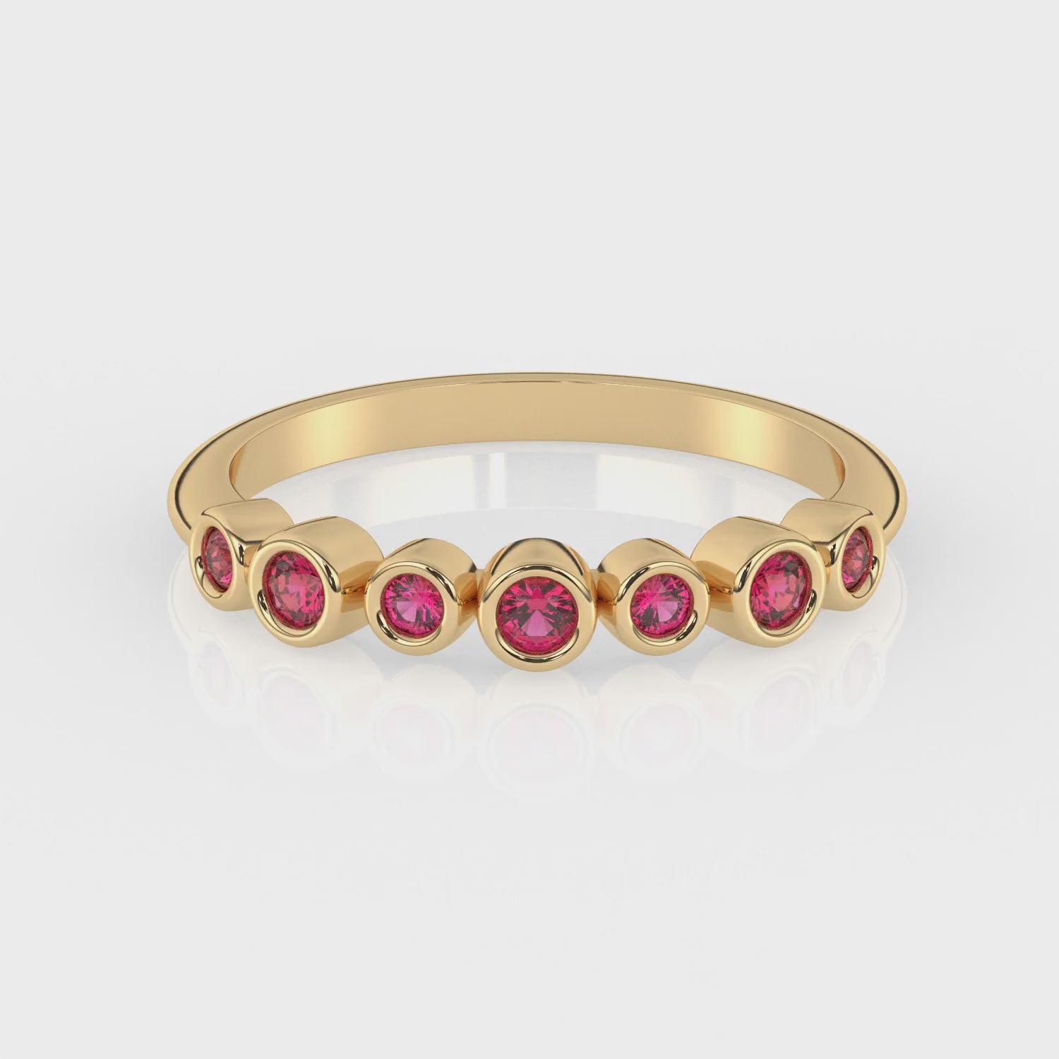 Bezel-Set Demi Ring with rubies by Shahla Karimi on white background