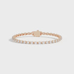 Shahla Karimi Invisible Set 3mm tennis bracelet in 14K yellow gold with round-cut diamonds on white background