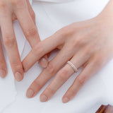 rings by Shahla Karimi on model on light background