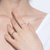 rings by Shahla Karimi on model on light background