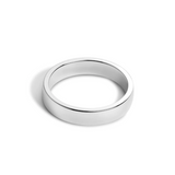 A 5mm wide, low-dome white gold band ring with a high polish finish.