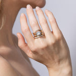 diamond ring stack on model's finger closeup