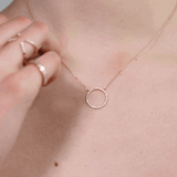 Central Park Hoop Necklace  by Shahla Karimi on model on light background GIF