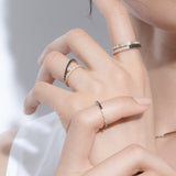 Shahla Karimi Jewelry Love Black and White Diamond V Ring 14K Yellow Gold on Model