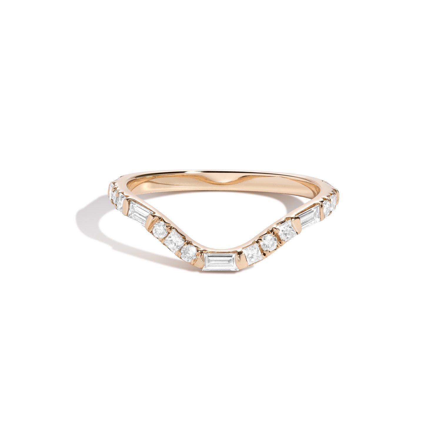 A curved yellow gold band ring with a central row of set white diamonds, surrounded by smaller round white diamonds.